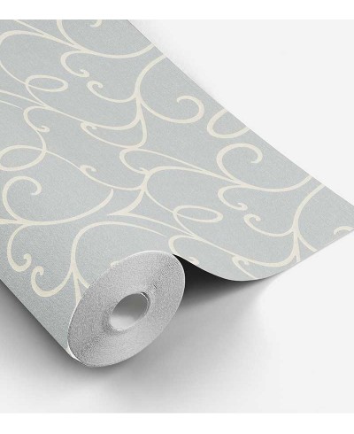 Papel de parede com fundo simulando jeans com detalhes arabescos na cor nude