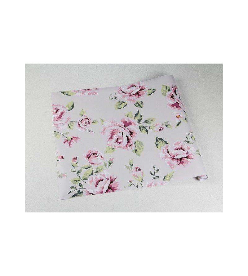 Papel de parede florais em fundo rosa claro e desenhos em amarelo, verde e rosa